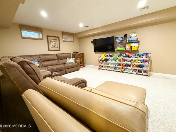 a view of staircase with a rug