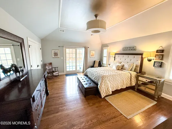 a bathroom with a shower and a sink