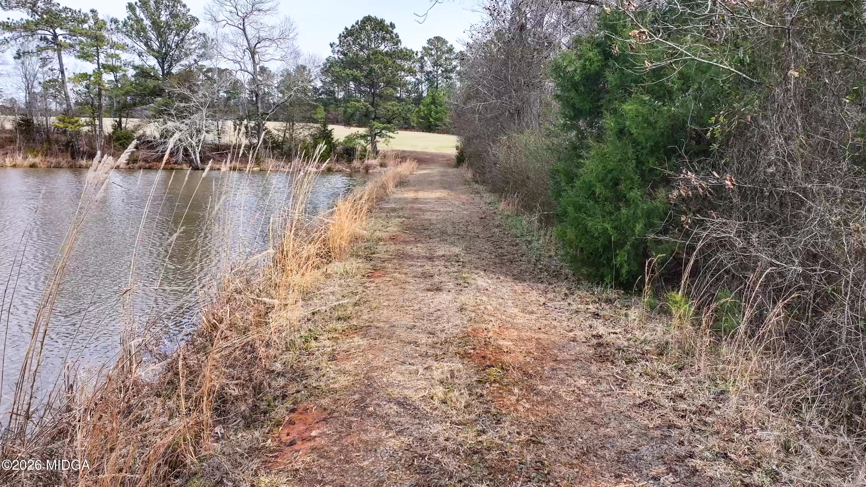 0 Colvin Road Forsyth, GA 31029 - Photo 14 of 23 a view of a lake with houses