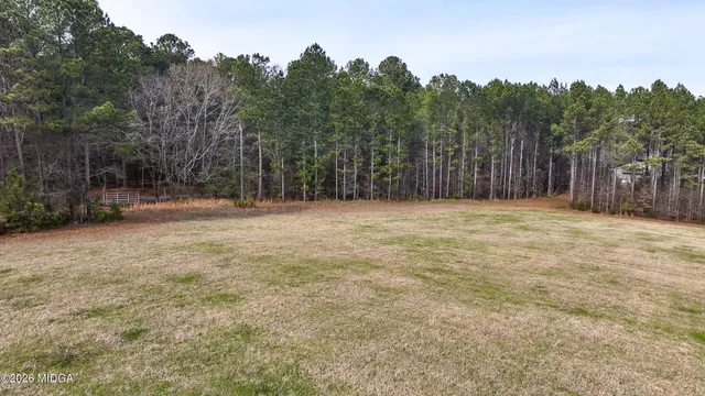 a backyard of a house with trees