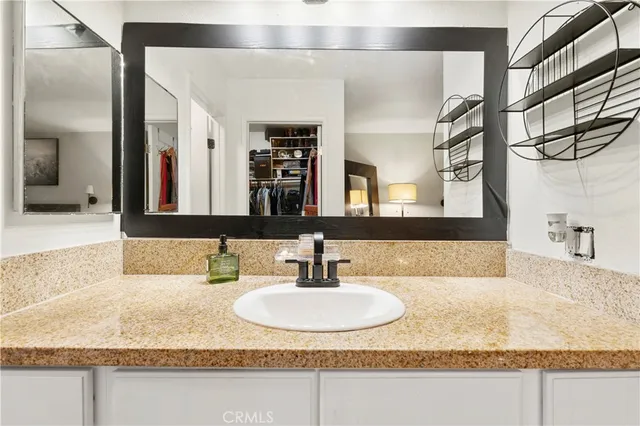 a bathroom with a shower and a tub