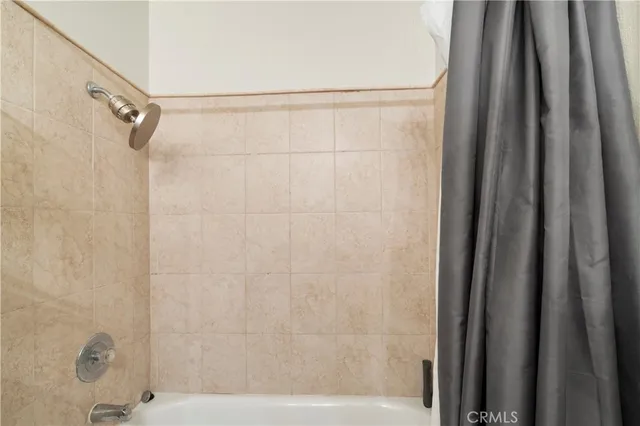 a view of a house with swimming pool and sitting area