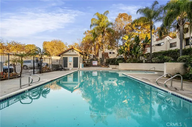 a view of swimming pool with a yard