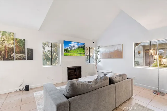 a kitchen with stainless steel appliances a refrigerator and a stove top oven