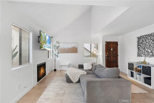 a kitchen with a dining table a sink and cabinets