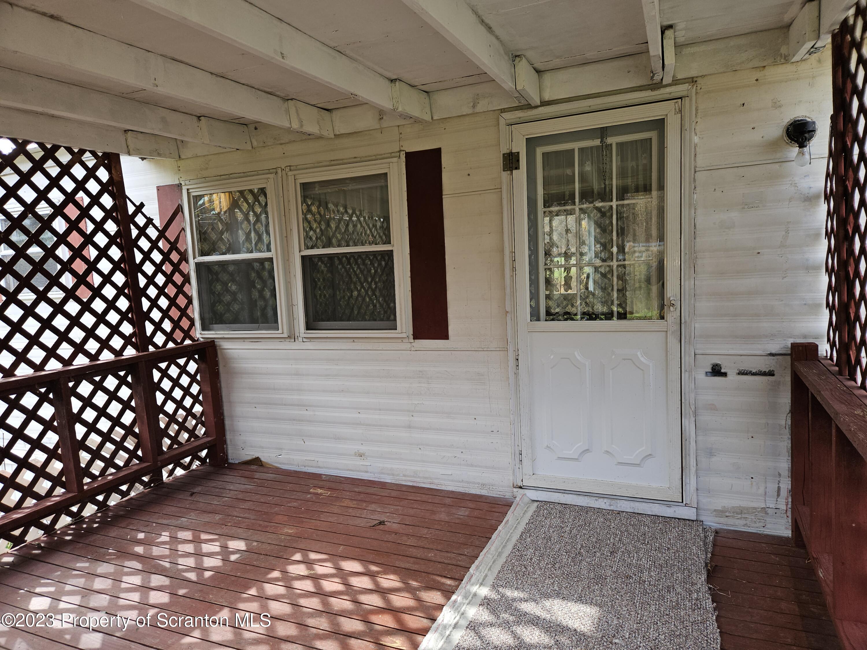 65 South Center Street Hop Bottom, PA 18824 - Photo 13 of 28 a view of front door