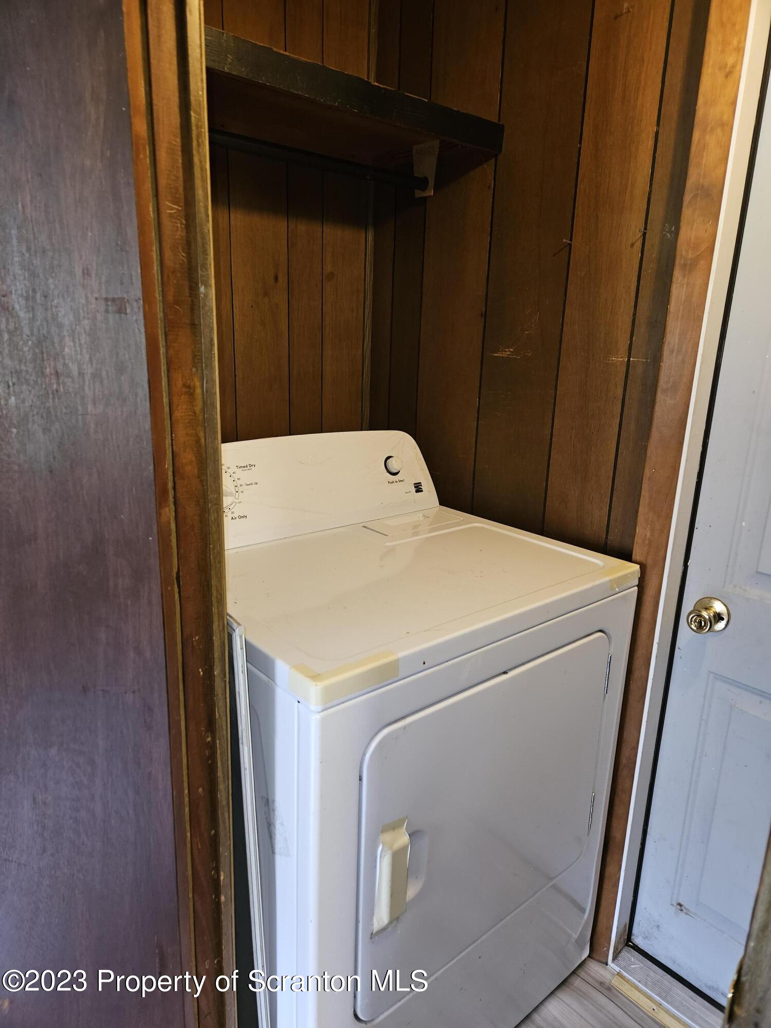 65 South Center Street Hop Bottom, PA 18824 - Photo 19 of 28 a utility room with dryer and washer