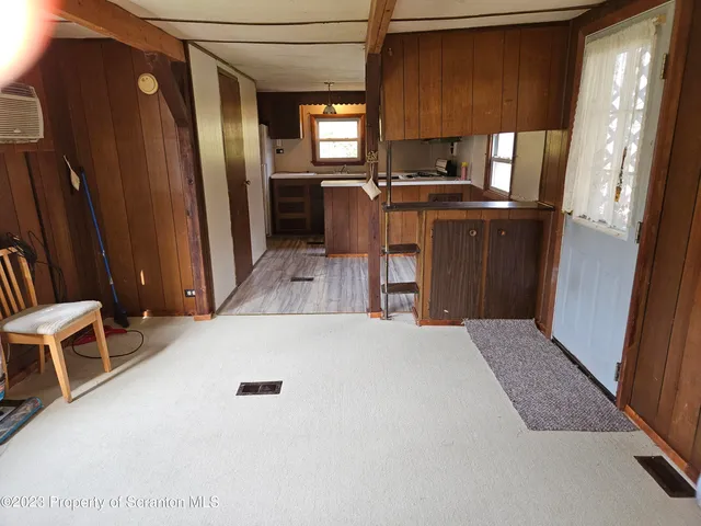 a kitchen with a sink and a window