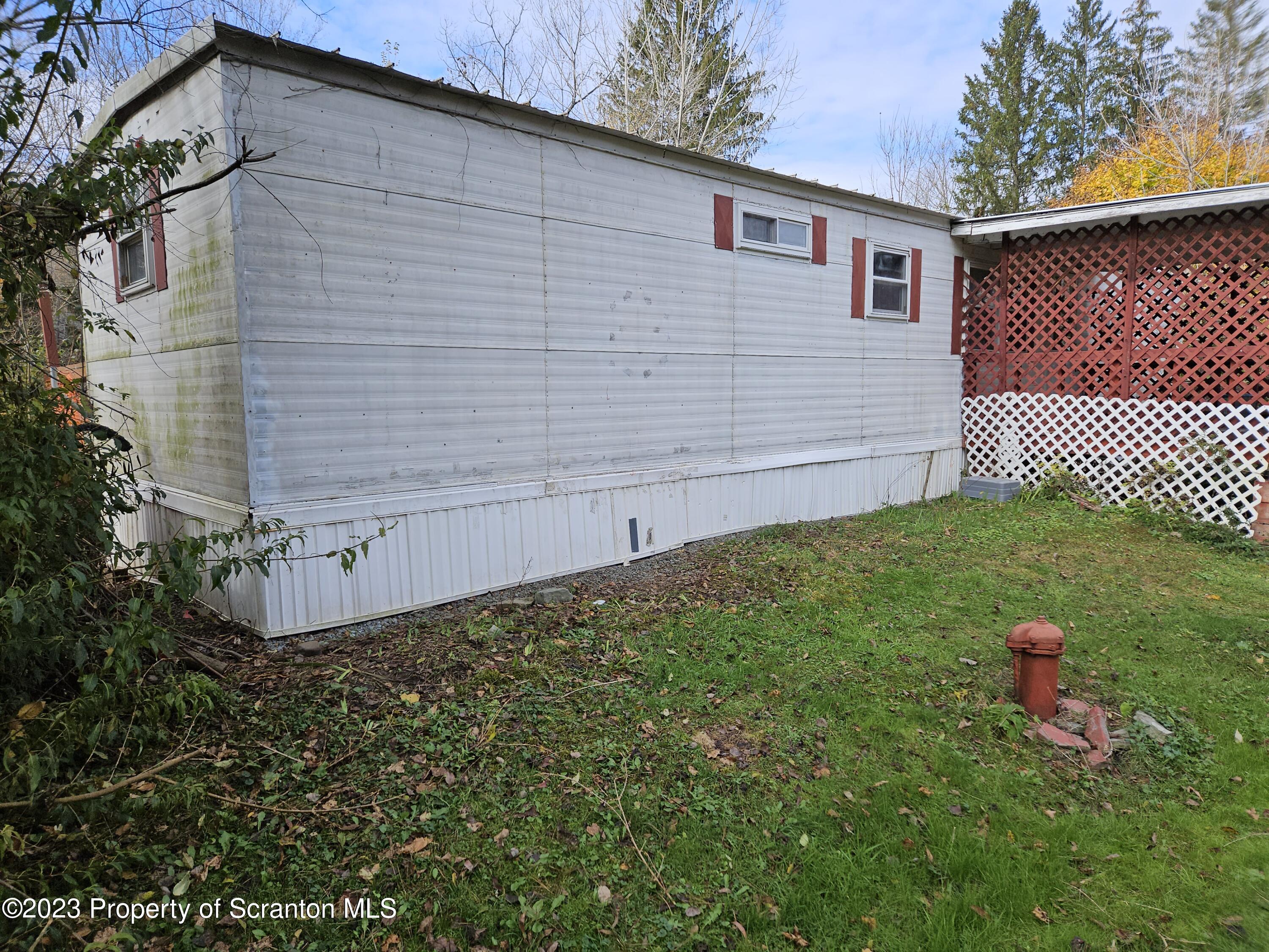 65 South Center Street Hop Bottom, PA 18824 - Photo 3 of 28 a view of a backyard of the house