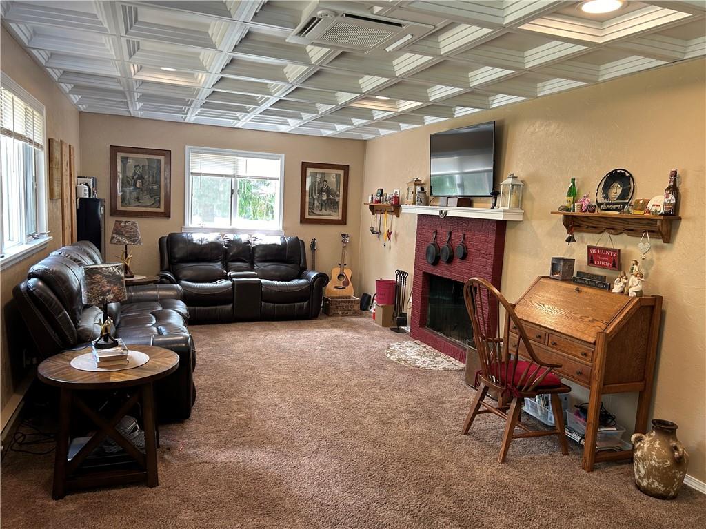 240 Martin Road Scottdale, PA 15683 - Photo 13 of 16 a living room with furniture and a fireplace