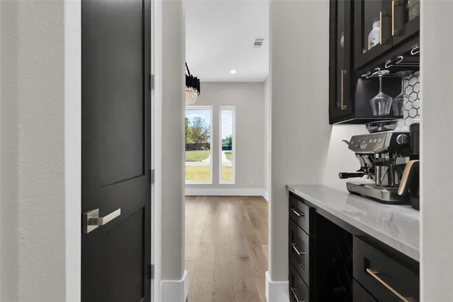 a kitchen with a sink and a window