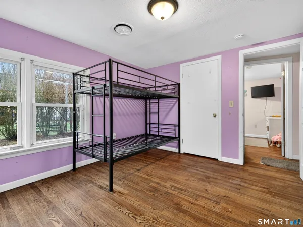 a view of a livingroom with wooden floor