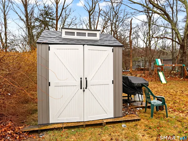 a view of backyard and tree