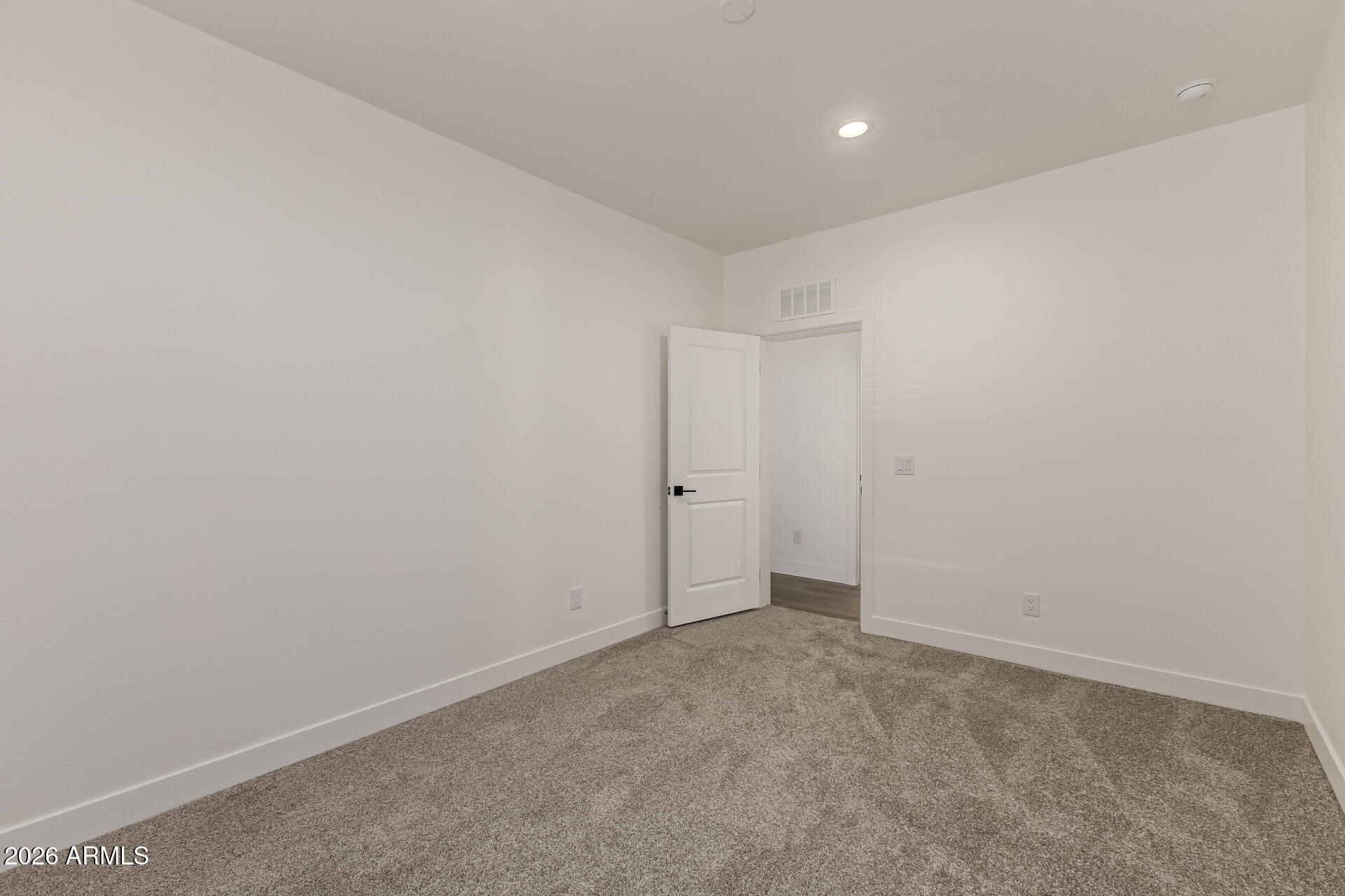 23059 West Rancho Laredo Drive Wittmann, AZ 85361 - Photo 15 of 29 a view of an empty room