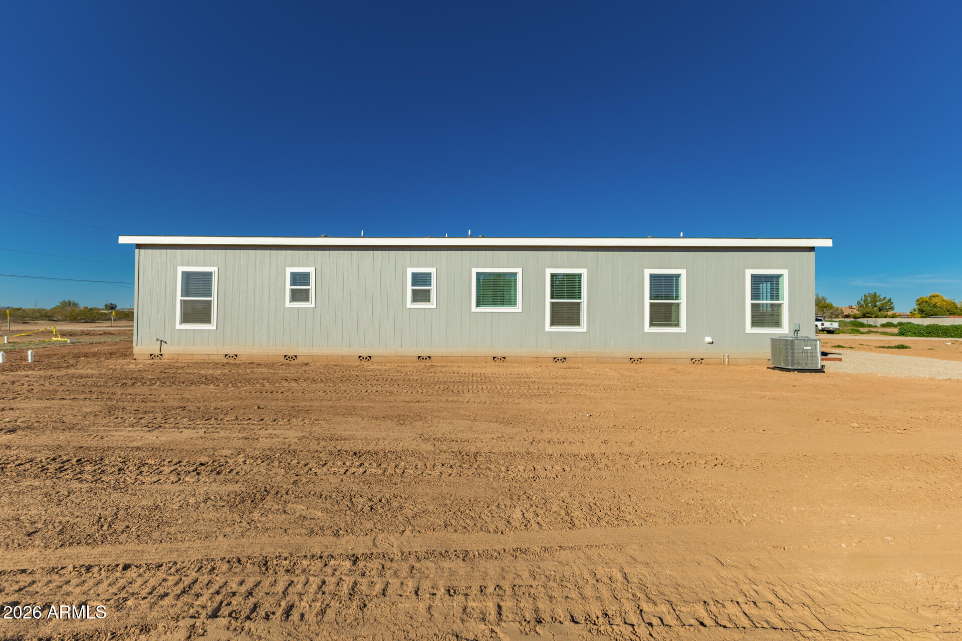 23059 West Rancho Laredo Drive Wittmann, AZ 85361 - Photo 28 of 29 a view of house with yard