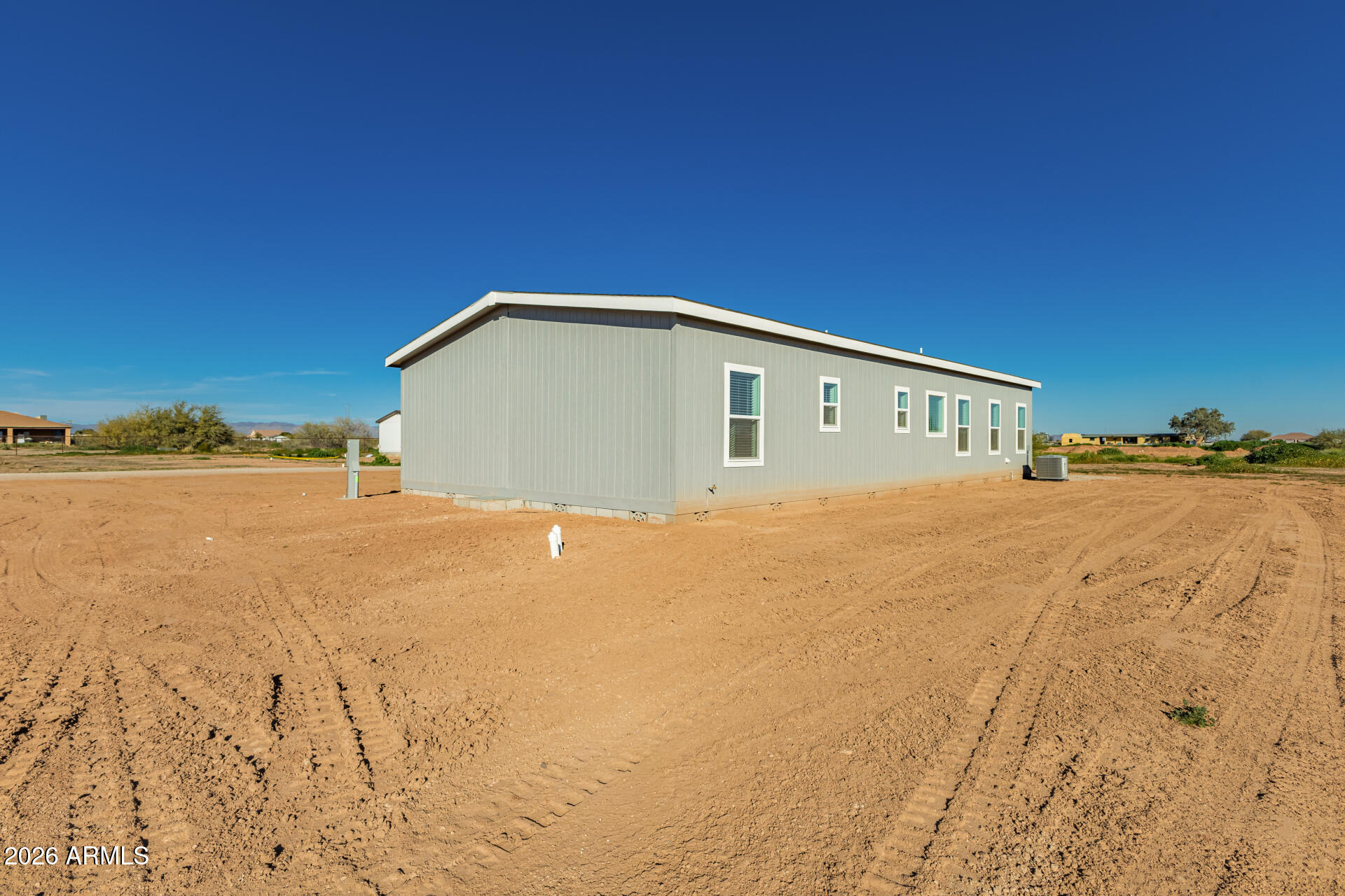 23059 West Rancho Laredo Drive Wittmann, AZ 85361 - Photo 29 of 29 a view of ocean with large building