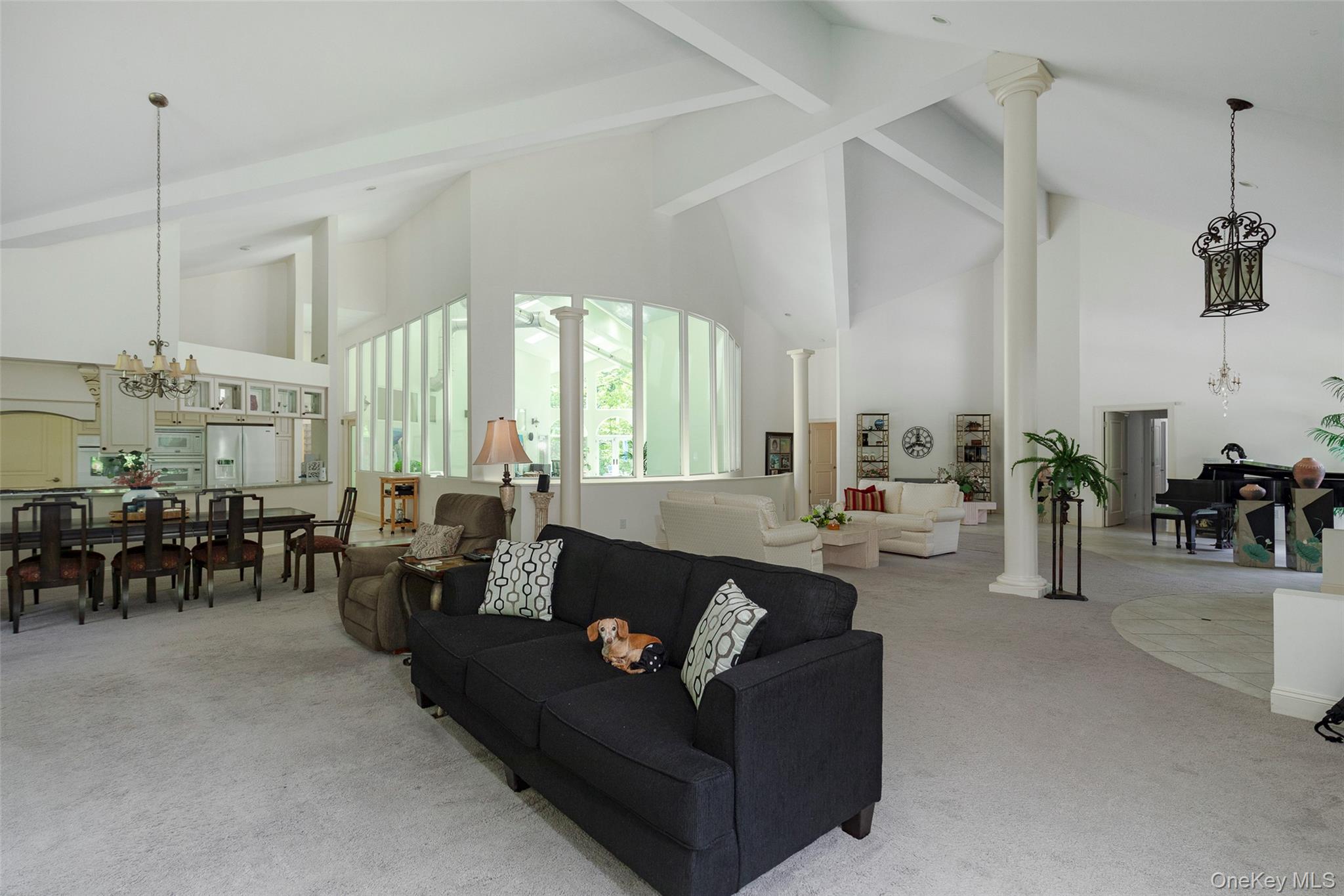 126 Old Hopewell Road Wappingers Falls, NY 12590 - Photo 7 of 38 a living room with furniture and a chandelier