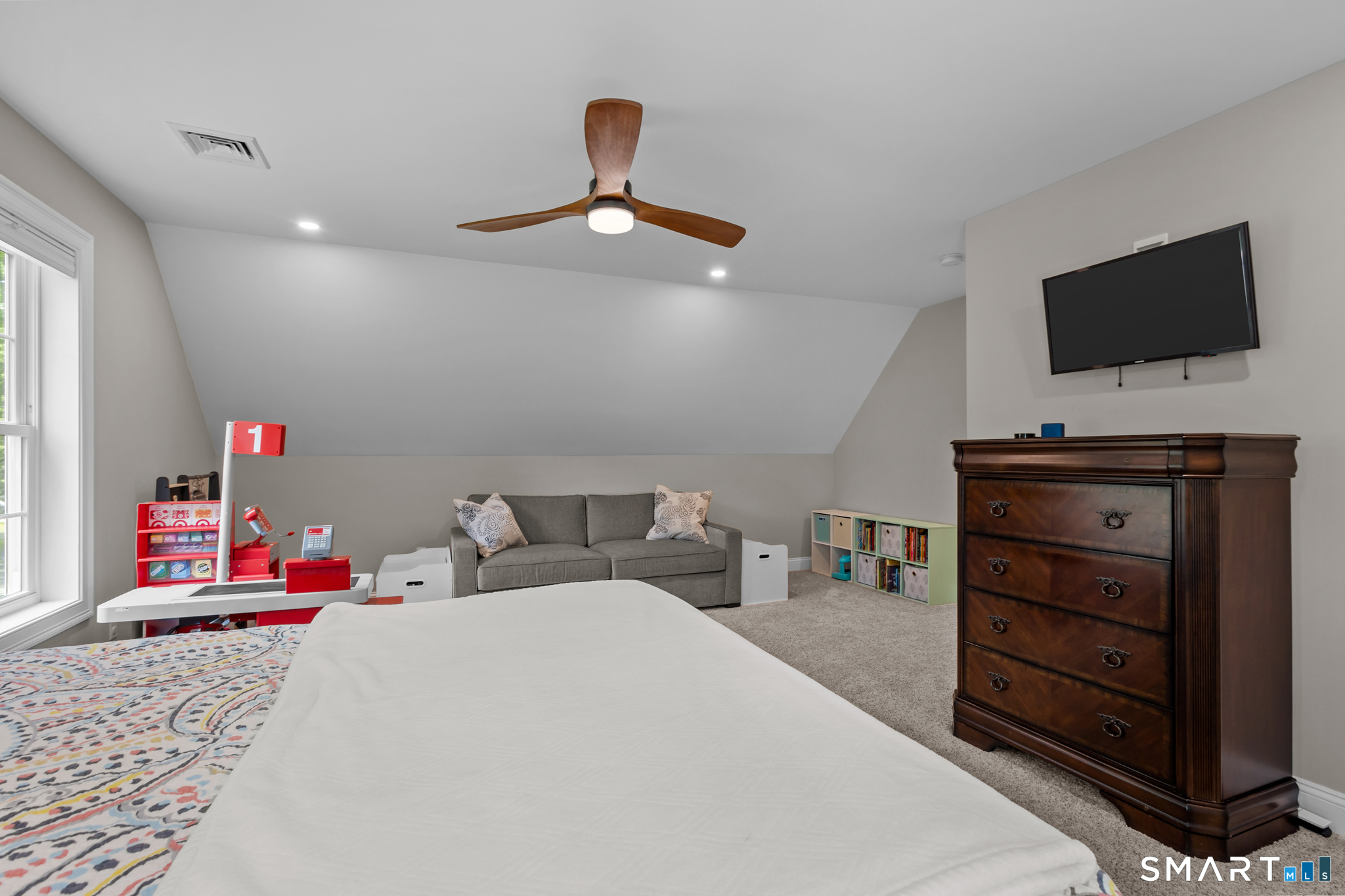 2 Martys Way Gales Ferry, CT 06335 - Photo 28 of 40 a bedroom with a bed and a flat screen tv
