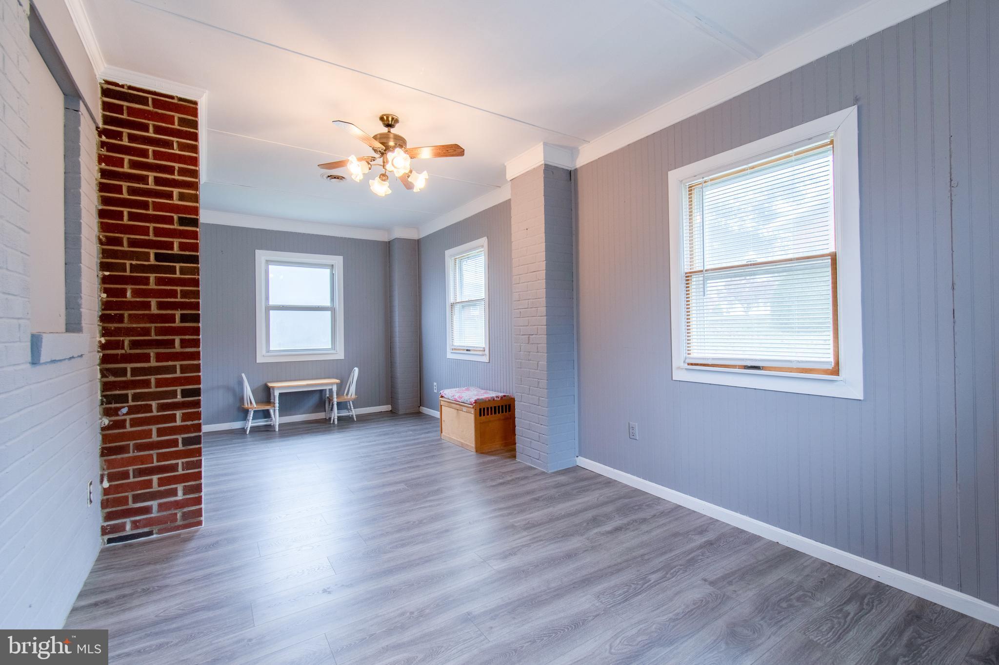 3911 Sunset Drive Hampstead, MD 21074 - Photo 18 of 38 a living room with furniture and wooden floor