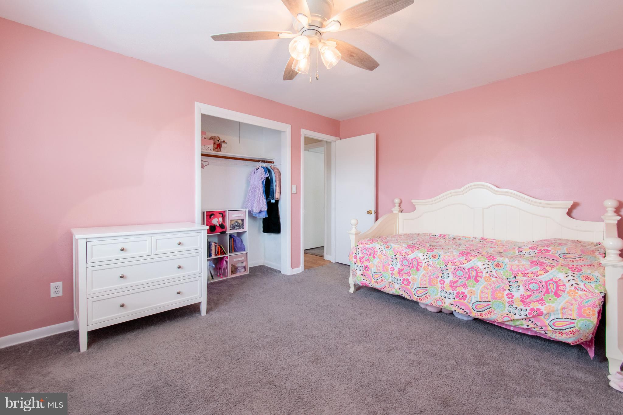 3911 Sunset Drive Hampstead, MD 21074 - Photo 26 of 38 a bedroom with a bed and a dresser