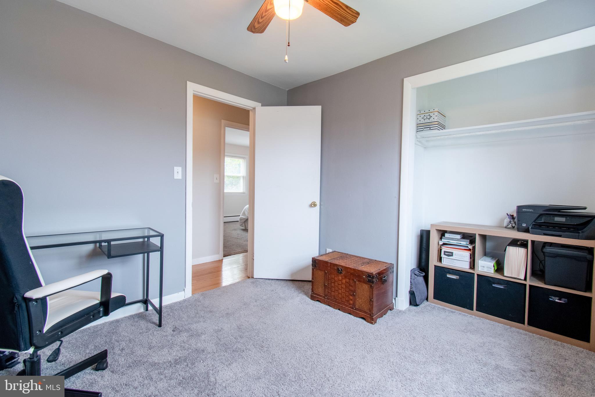 3911 Sunset Drive Hampstead, MD 21074 - Photo 28 of 38 a living room with furniture and a chandelier