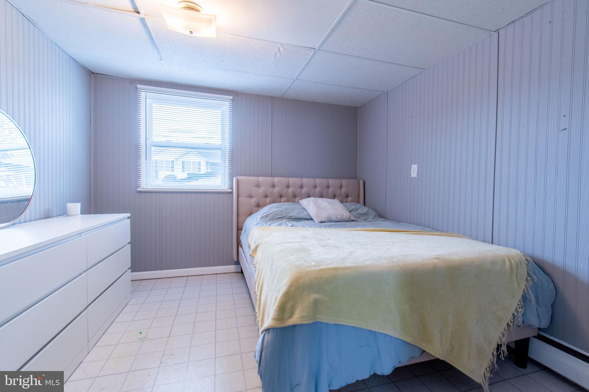 3911 Sunset Drive Hampstead, MD 21074 - Photo 29 of 38 a bedroom with a bed and a window