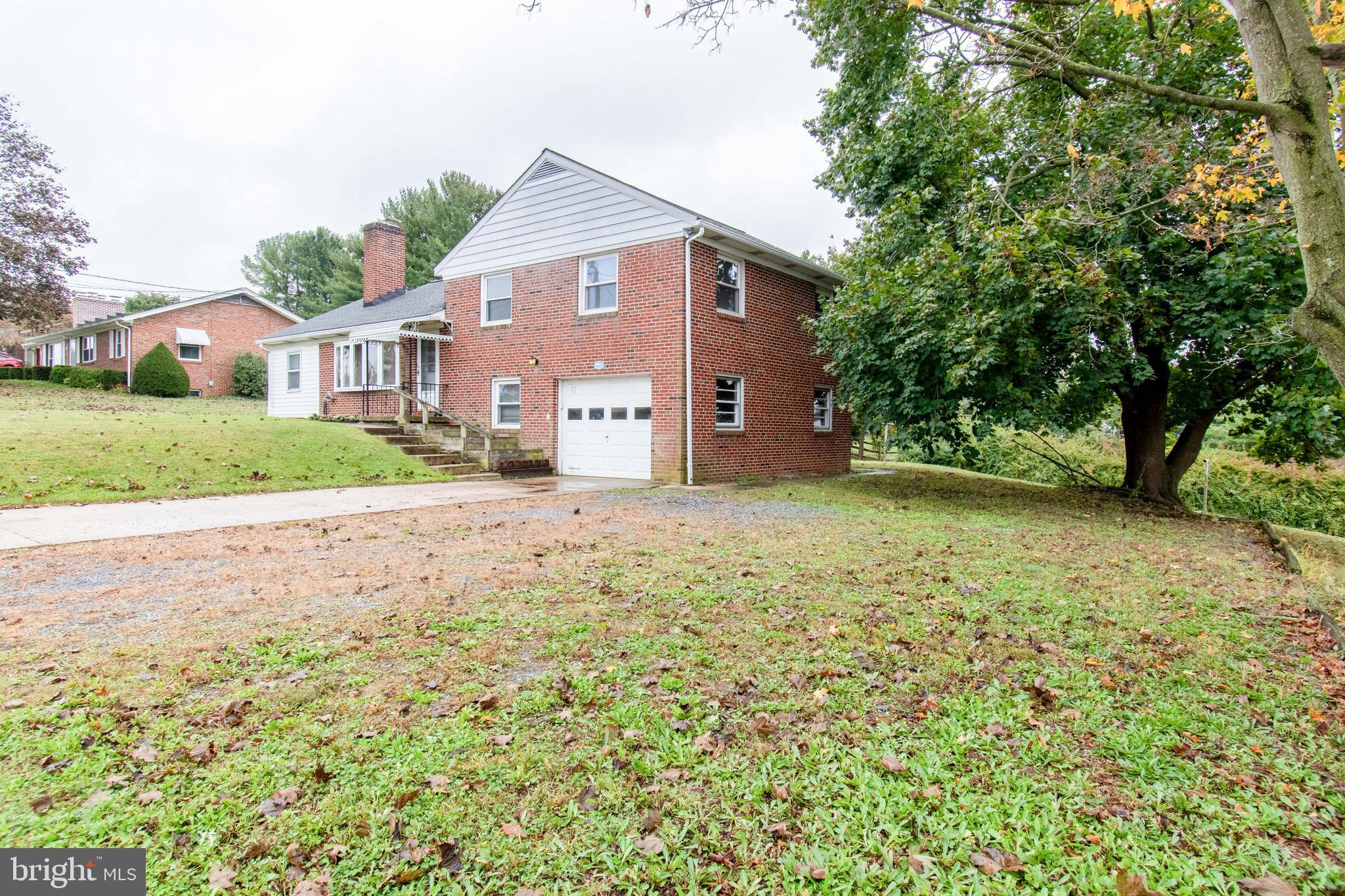 3911 Sunset Drive Hampstead, MD 21074 - Photo 32 of 38 a view of a house with a yard