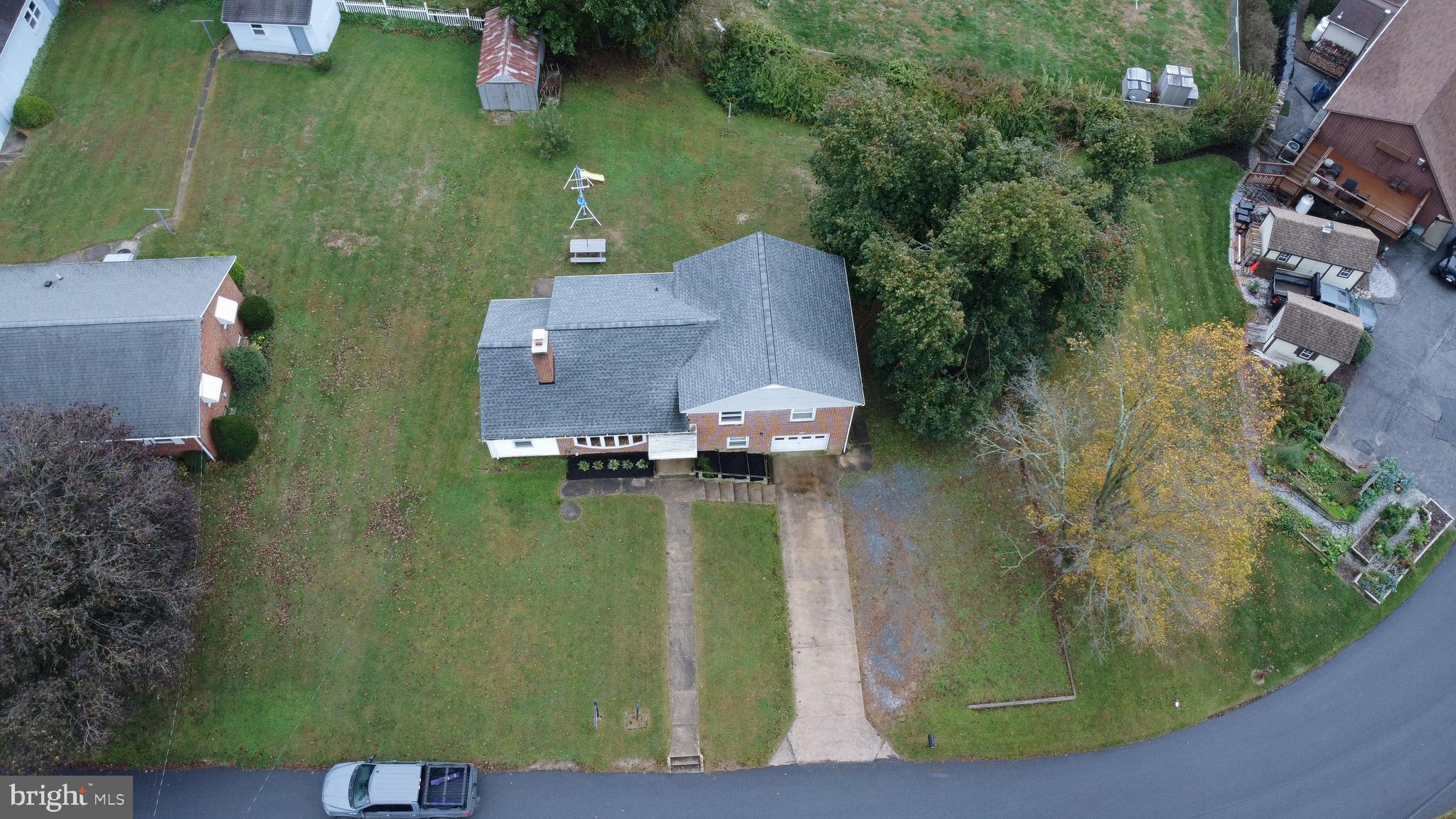 3911 Sunset Drive Hampstead, MD 21074 - Photo 38 of 38 an aerial view of a house with a yard basket ball court and outdoor seating