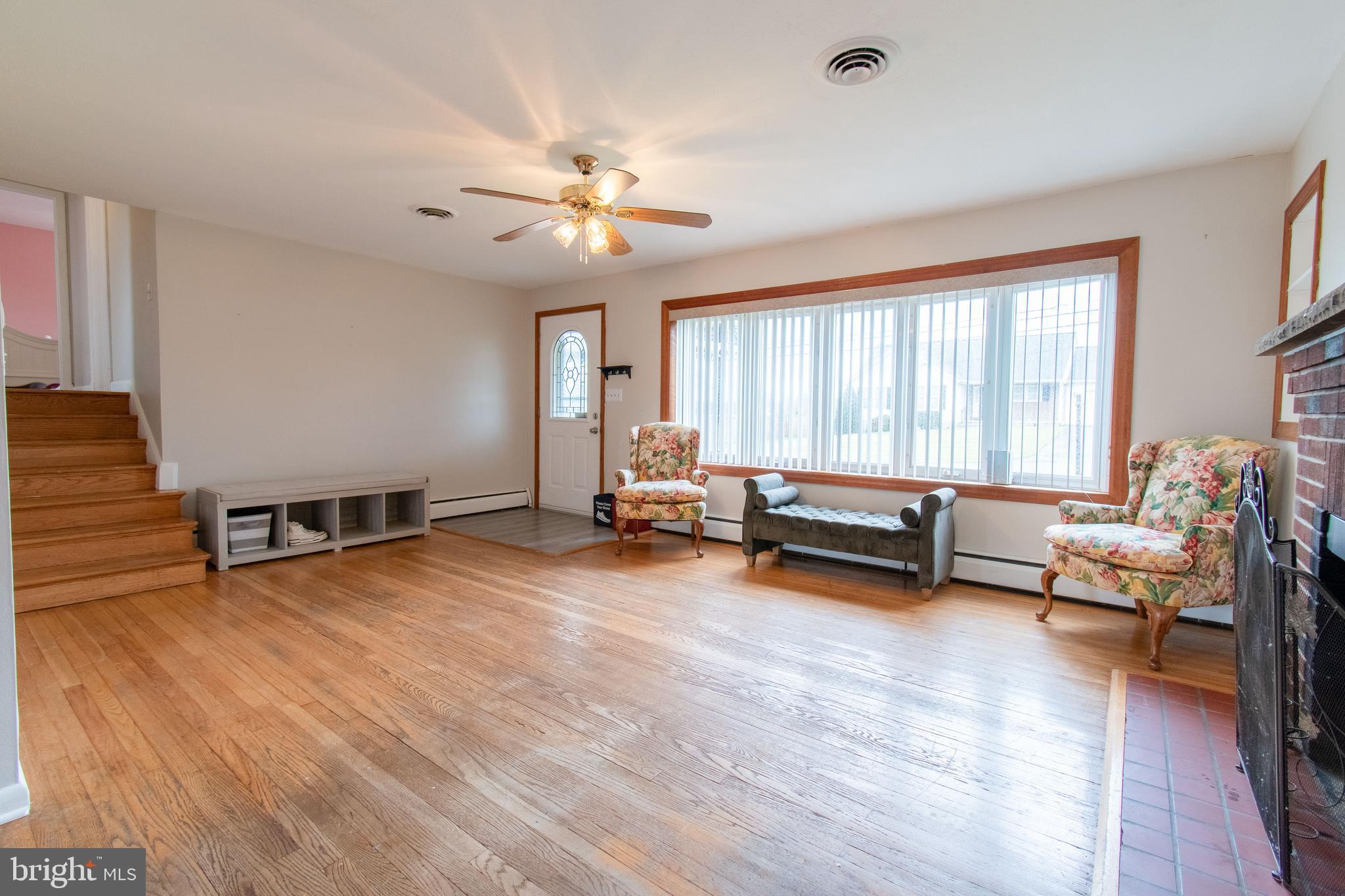 3911 Sunset Drive Hampstead, MD 21074 - Photo 5 of 38 a living room with furniture and a wooden floor