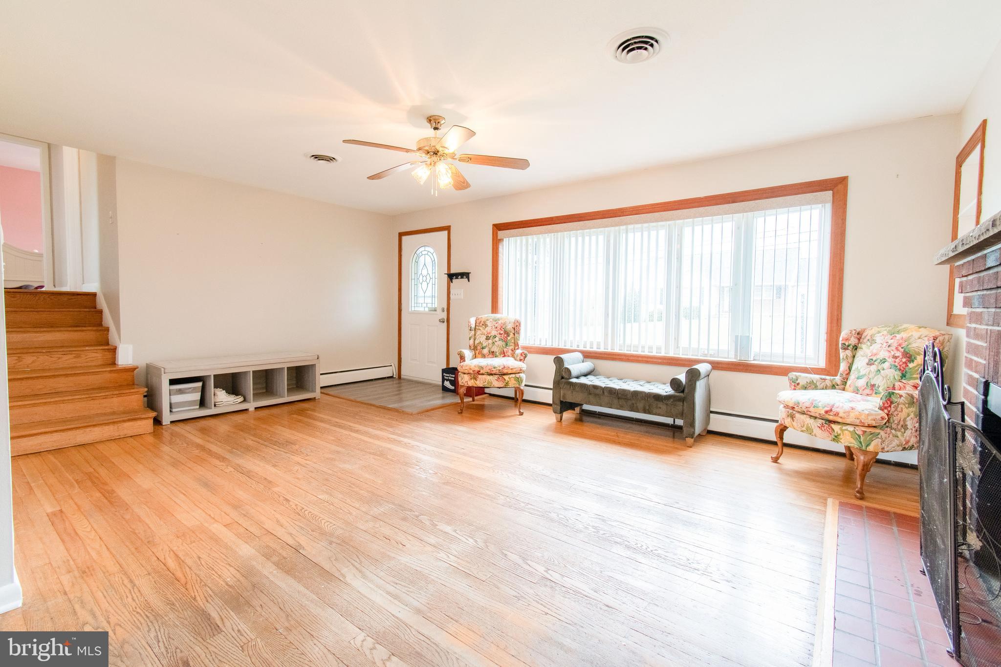 3911 Sunset Drive Hampstead, MD 21074 - Photo 7 of 38 a view of a livingroom with furniture and a window