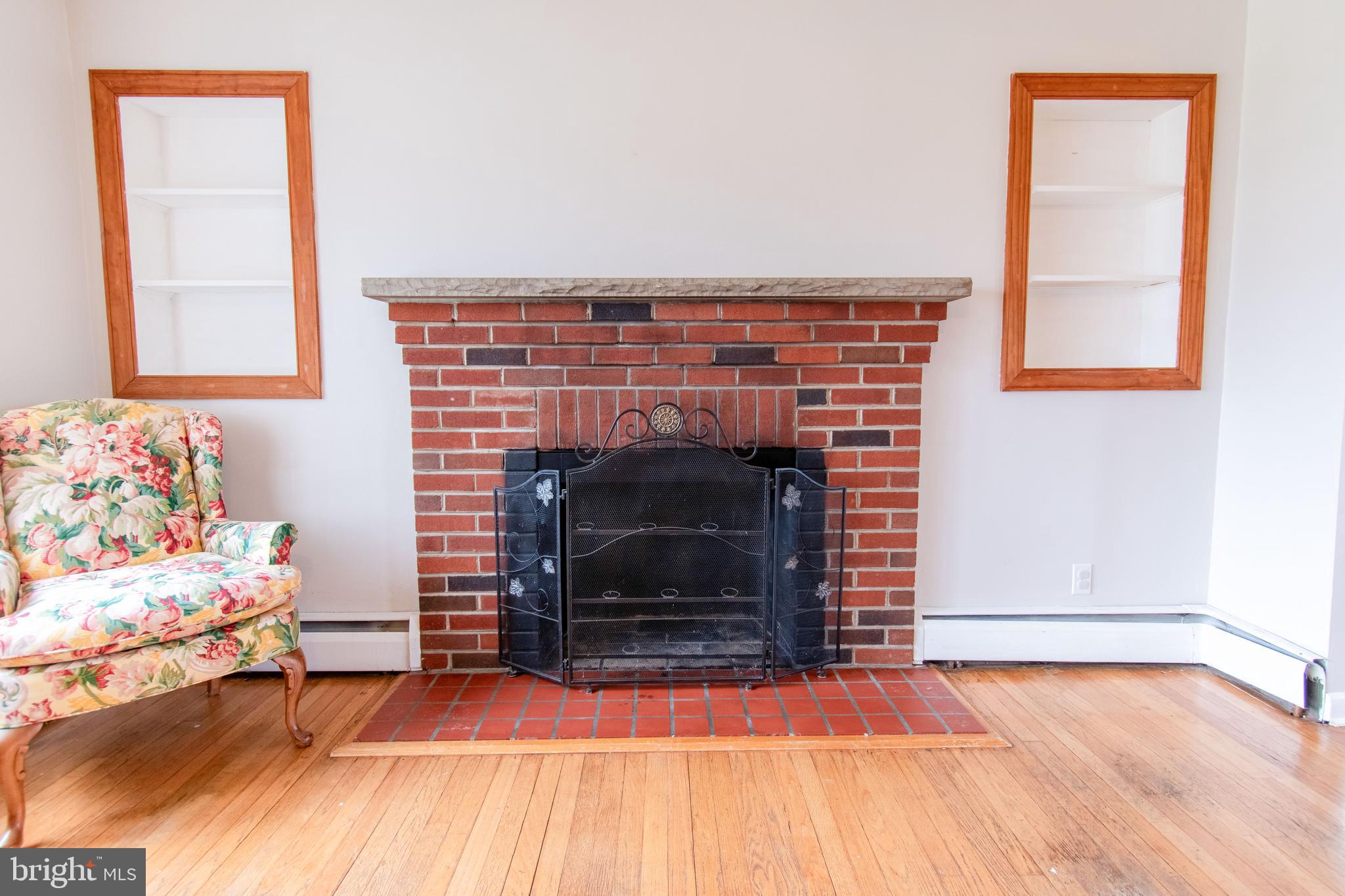 3911 Sunset Drive Hampstead, MD 21074 - Photo 9 of 38 a living room with a fireplace in it