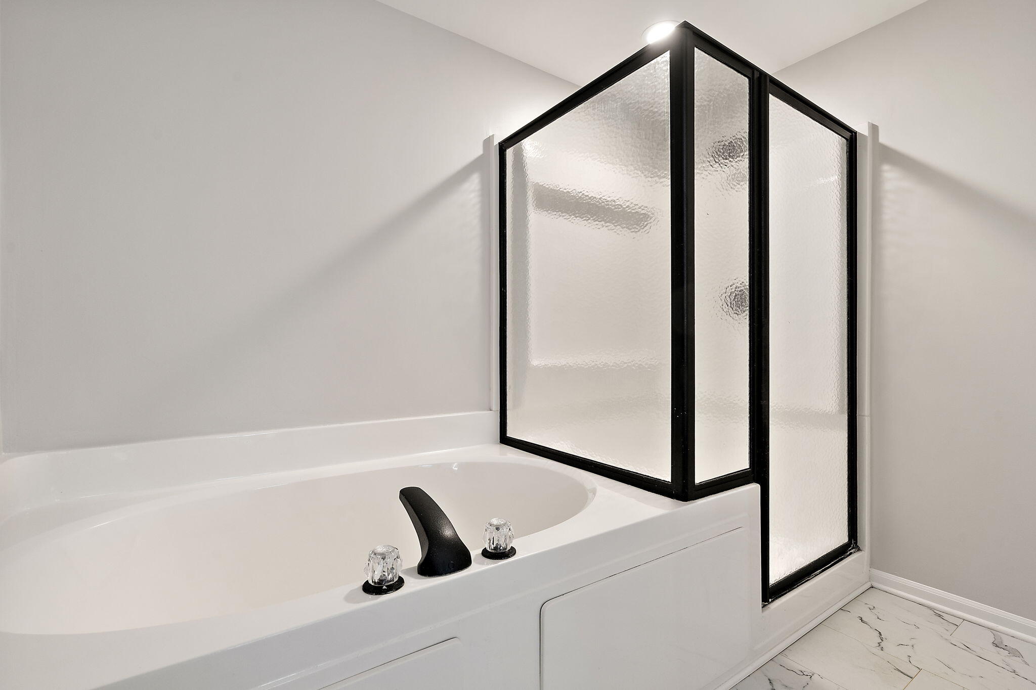 15976 97th Court Dyer, IN 46311 - Photo 15 of 29 a bathroom with a shower and a mirror