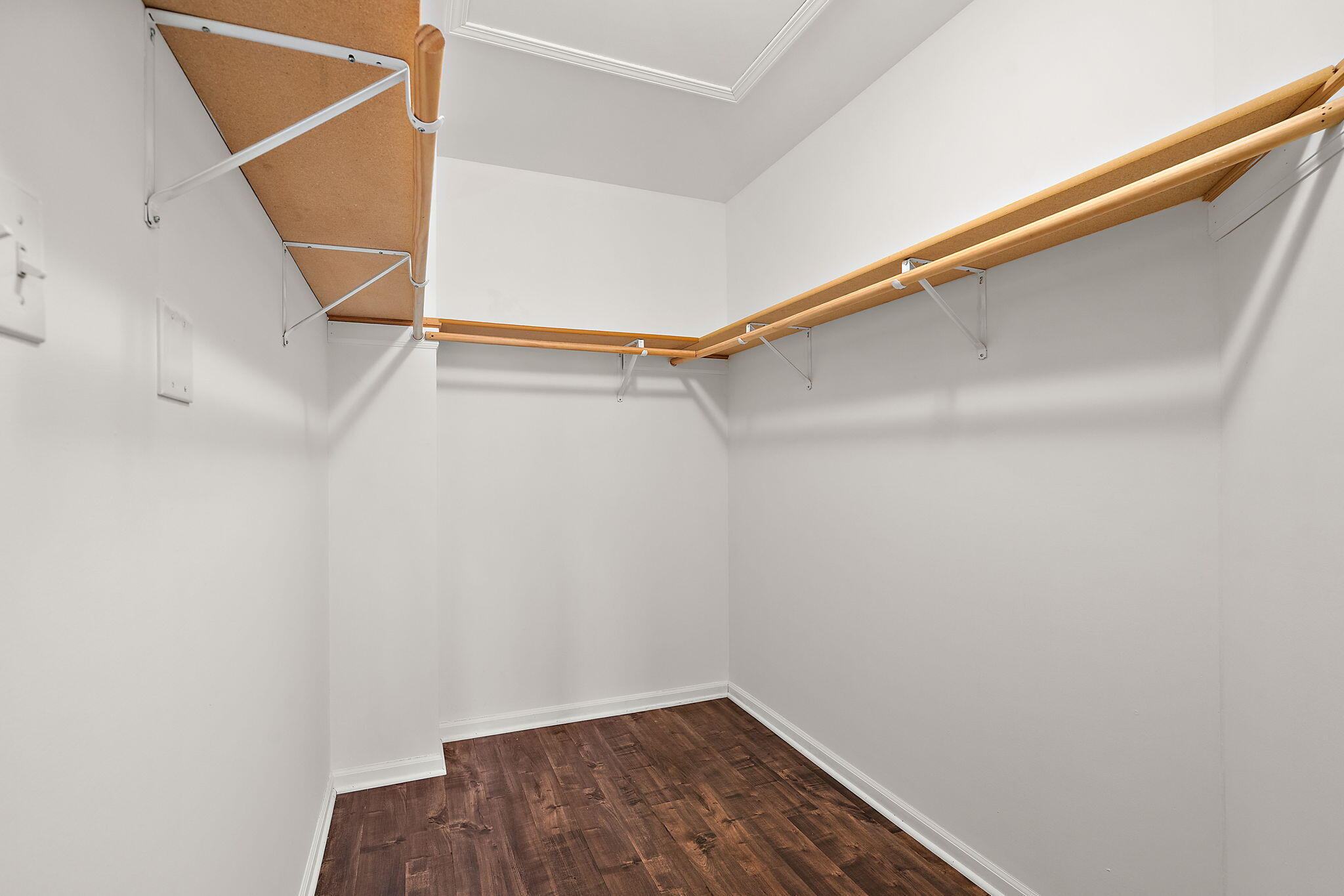 15976 97th Court Dyer, IN 46311 - Photo 16 of 29 a view of a room with racks on the wall