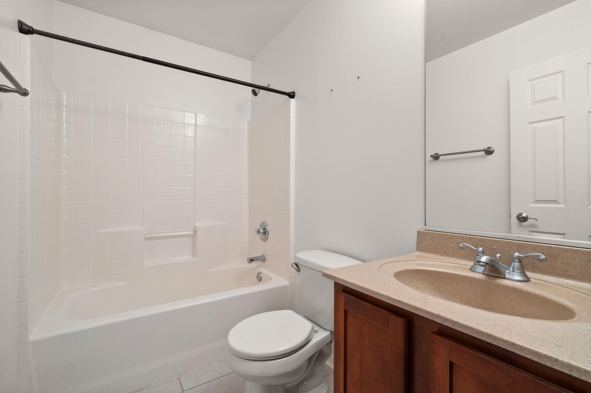 15976 97th Court Dyer, IN 46311 - Photo 23 of 29 a bathroom with a granite countertop sink toilet and shower