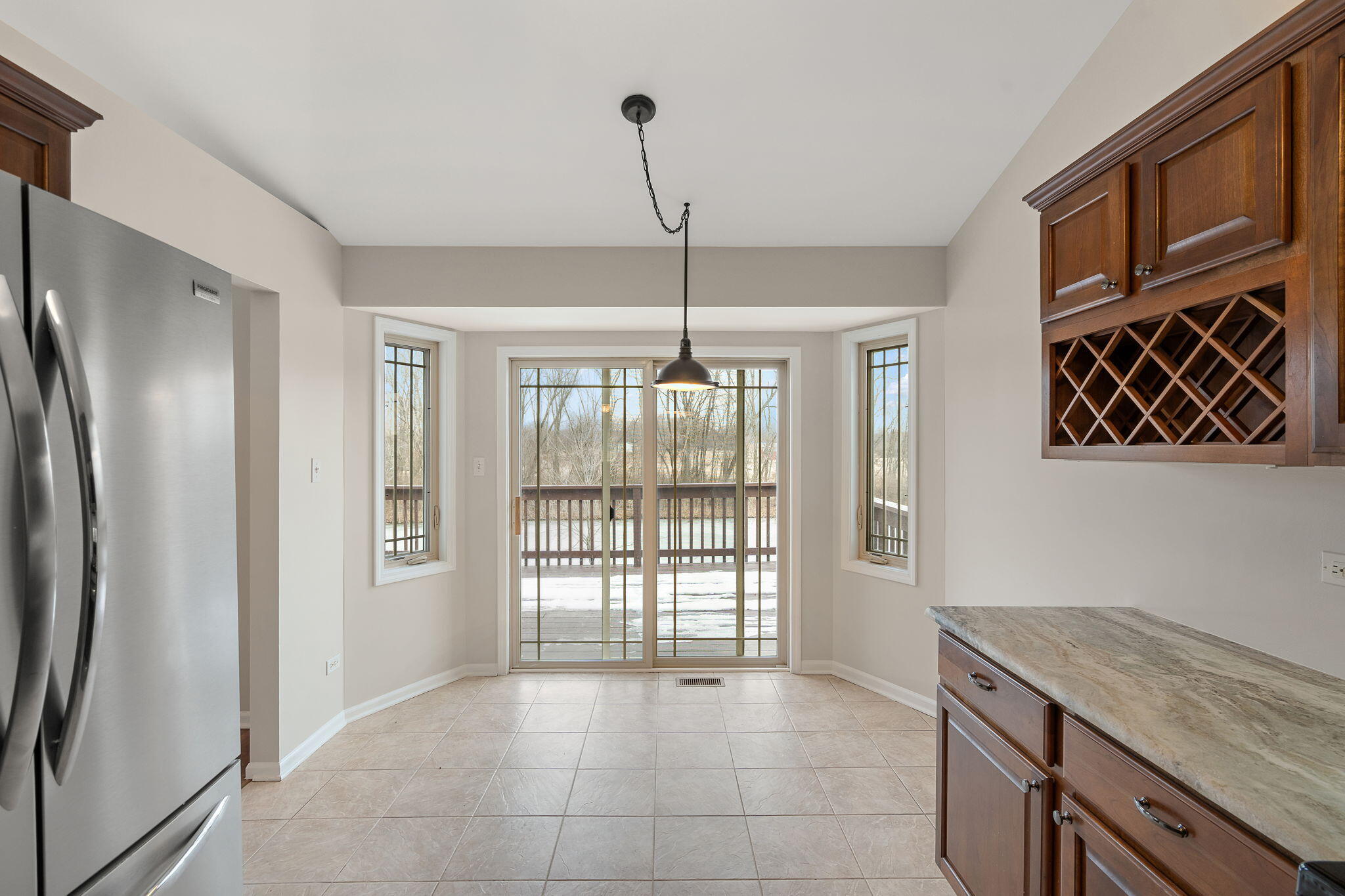 15976 97th Court Dyer, IN 46311 - Photo 9 of 29 a kitchen with stainless steel appliances granite countertop a refrigerator and a sink