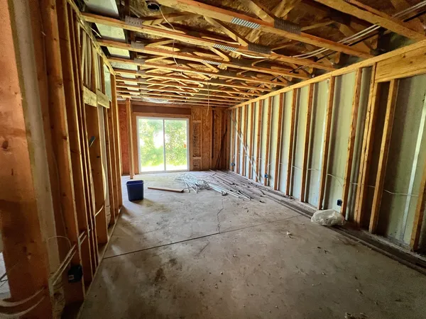 a view of empty room with windows