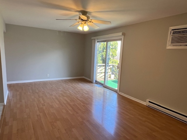 20206 South Frankfort Square Road, Unit K Frankfort, IL 60423 - Photo 15 of 30 a view of an empty room with wooden floor and a window