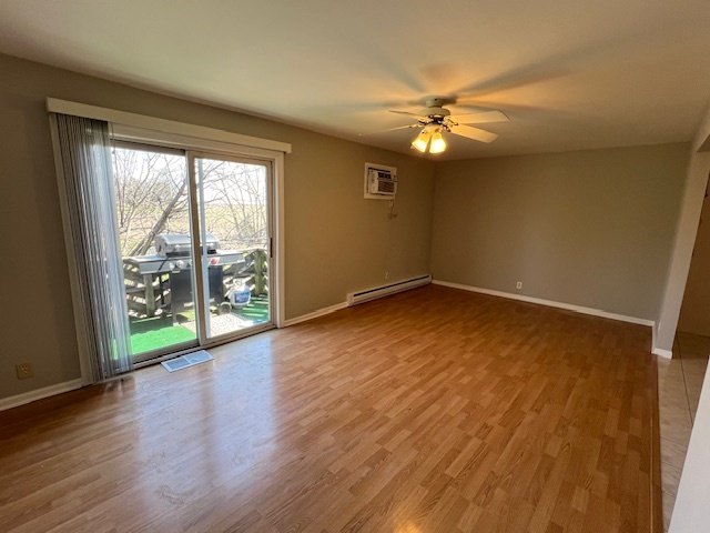20206 South Frankfort Square Road, Unit K Frankfort, IL 60423 - Photo 17 of 30 a view of an empty room with wooden floor and a window