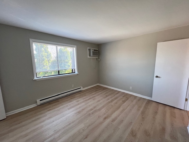 20206 South Frankfort Square Road, Unit K Frankfort, IL 60423 - Photo 19 of 30 an empty room with wooden floor and windows