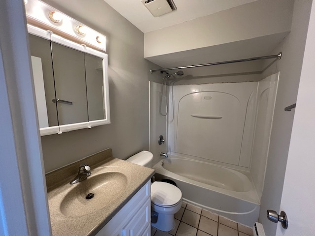 20206 South Frankfort Square Road, Unit K Frankfort, IL 60423 - Photo 26 of 30 a bathroom with a sink toilet and shower