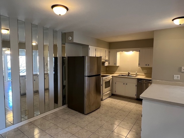 20206 South Frankfort Square Road, Unit K Frankfort, IL 60423 - Photo 5 of 30 a kitchen with a refrigerator and a sink