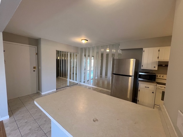 20206 South Frankfort Square Road, Unit K Frankfort, IL 60423 - Photo 6 of 30 a view of a kitchen with refrigerator and wooden floor