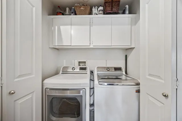 a bedroom with bed and window