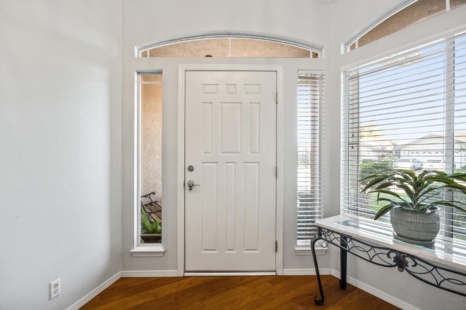 161 Sunset Street Kingsburg, CA 93631 - Photo 3 of 57 a view of a room that has a window and wooden floor
