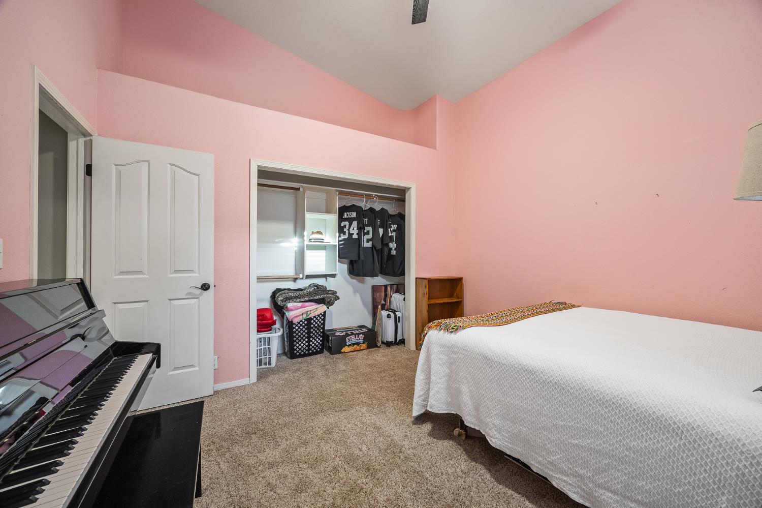 161 Sunset Street Kingsburg, CA 93631 - Photo 35 of 57 a bedroom with a bed and a dresser