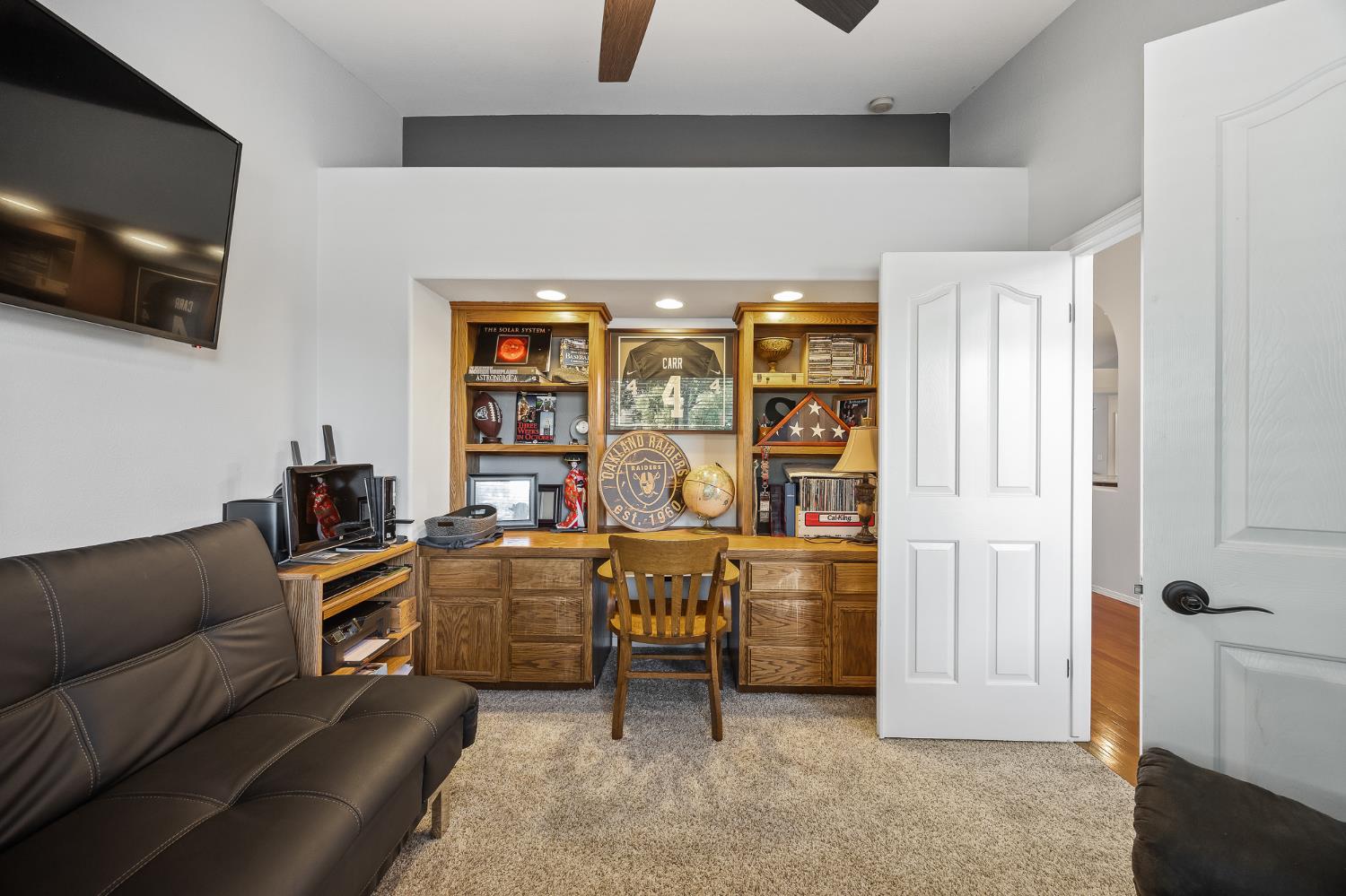 161 Sunset Street Kingsburg, CA 93631 - Photo 7 of 57 a living room with furniture and a flat screen tv