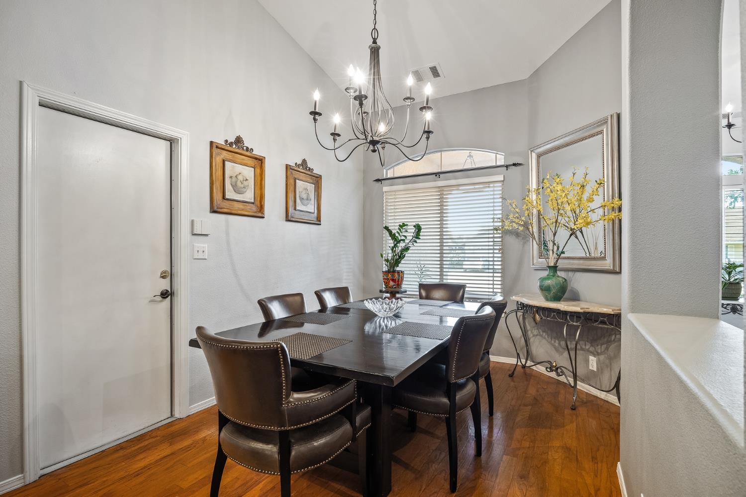 161 Sunset Street Kingsburg, CA 93631 - Photo 8 of 57 a view of a dining room with furniture window and wooden floor