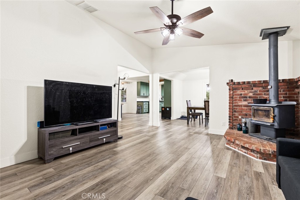 14366 Carnegie Road Magalia, CA 95954 - Photo 4 of 28 a living room with furniture and a flat screen tv