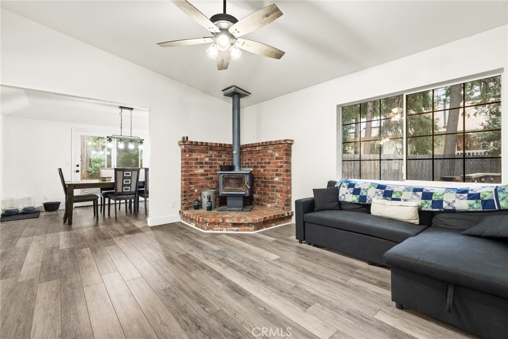 14366 Carnegie Road Magalia, CA 95954 - Photo 5 of 28 a living room with furniture and a floor to ceiling window