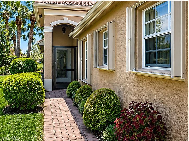1654 Triangle Palm Terrace Naples, FL 34119 - Photo 3 of 4 Stunning and well kept home complete with shutters and beautiful landscaping